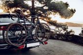 Crossover car with two road bicycles loaded on a rack